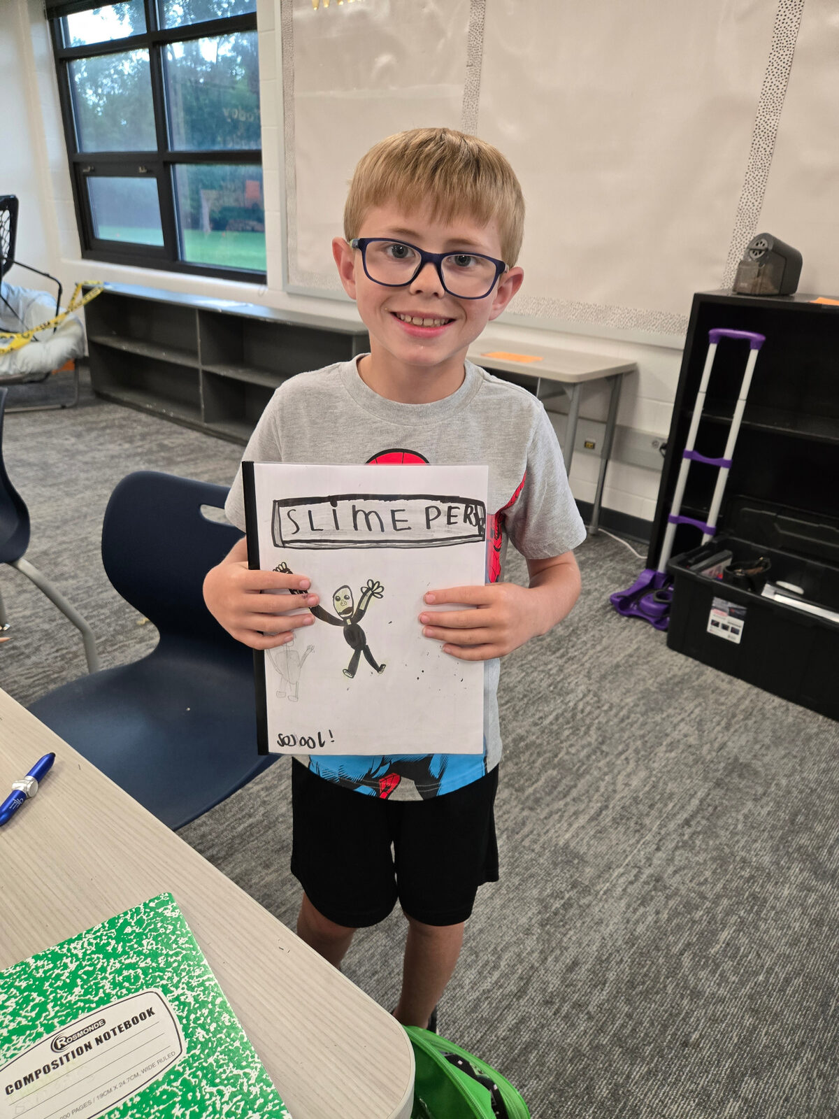 Children sharing comic books at a Recreation Academy club